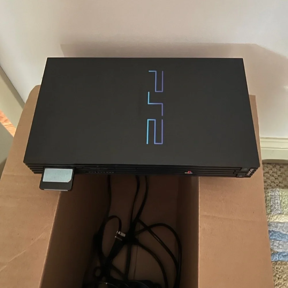 Sony PlayStation 2 Console with 1 Black and 1 Blue Controller